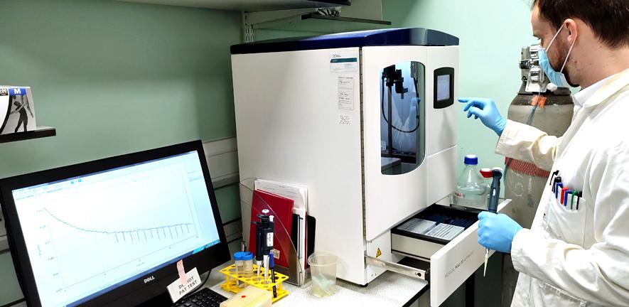 Biomedical Isothermal Titration Calorimetry Facility Technician operating Biomedical Isothermal Titration Calorimetry Facility
